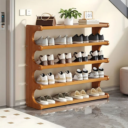 Wooden shoe rack with various shoes on shelves in a room.