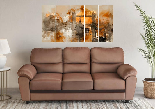 Brown leather sofa in a living room with abstract wall art and a plant.