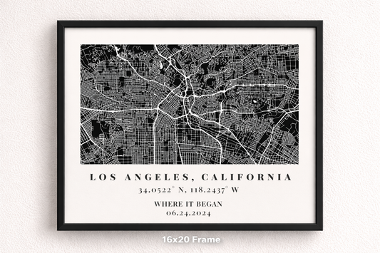Framed black and white map of Los Angeles, California on a white wall.