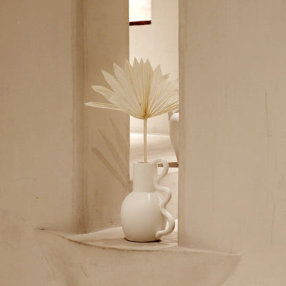 Minimalist ceramic vase in neutral tones for modern home décor