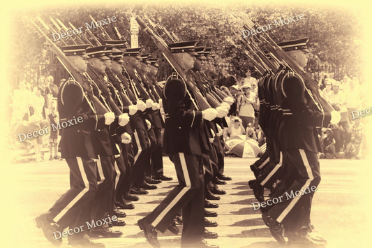 Black and white photograph of soldiers in uniform with rifles during a ceremony.